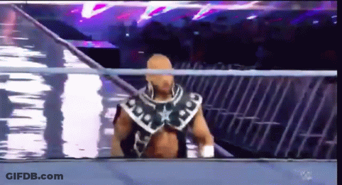Wrestler Walking Out Of Ring With Crowd Watching GIF