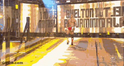 Wrestler Walking Past Shelton Sign GIF