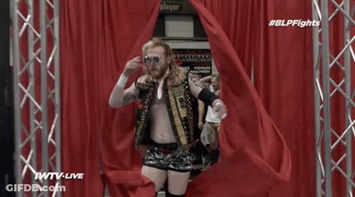 Wrestler Walking Through Red Curtain IWTV Live GIF