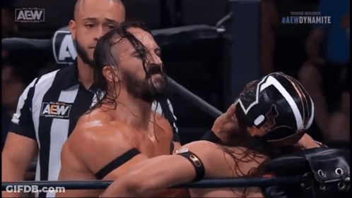 Wrestler With AEW Logo Wrestling Another Wrestler GIF