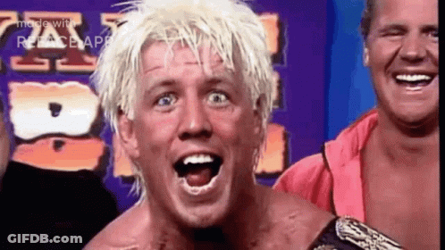 Wrestler With Blonde Hair Laughing GIF