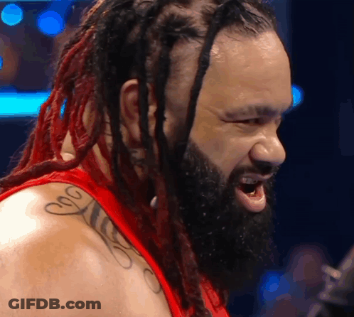 Wrestler With Dreadlocks And Beard In Red Shirt GIF