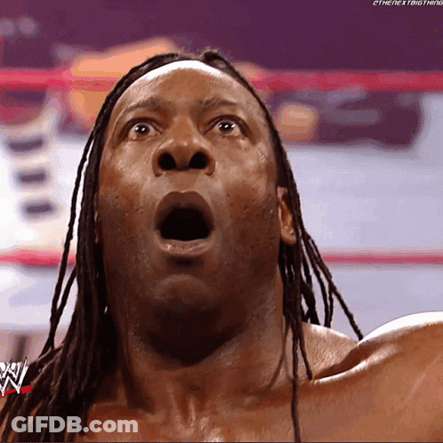 Wrestler With Dreadlocks Looking Up GIF