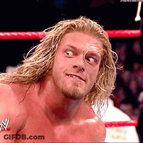 Wrestler With Long Blonde Hair And Beard In Ring GIF