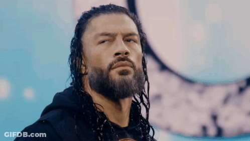 Wrestler With Long Hair And Beard On Stage GIF