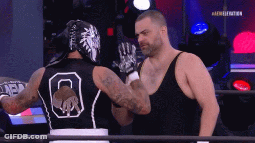 Wrestler With Number 8 Shaking Hands GIF