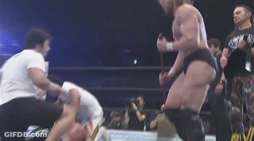 Wrestler With Rope Around Waist In Wrestling Ring GIF