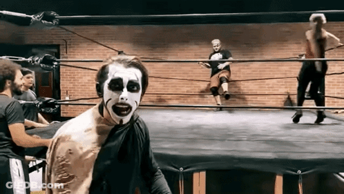 Wrestler With Zombie Face Paint GIF