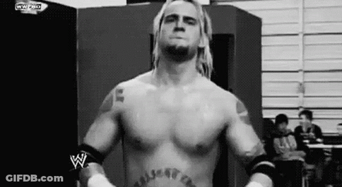 Wrestler Without Shirt Standing In Ring GIF