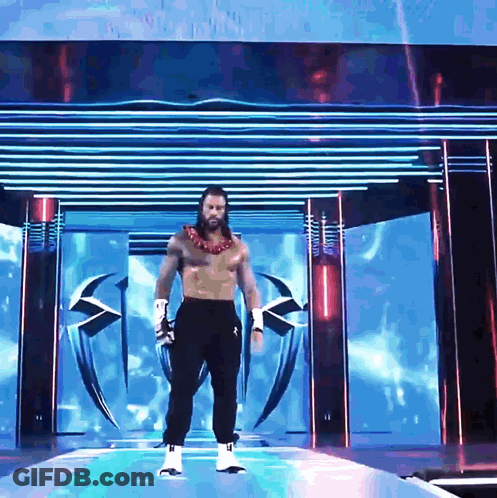 Wrestler Without Shirt Walking Down Runway GIF