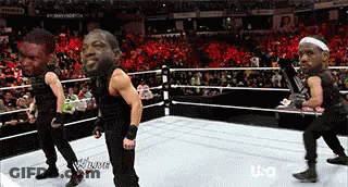 Wrestlers Dancing In Ring With USA Logo GIF