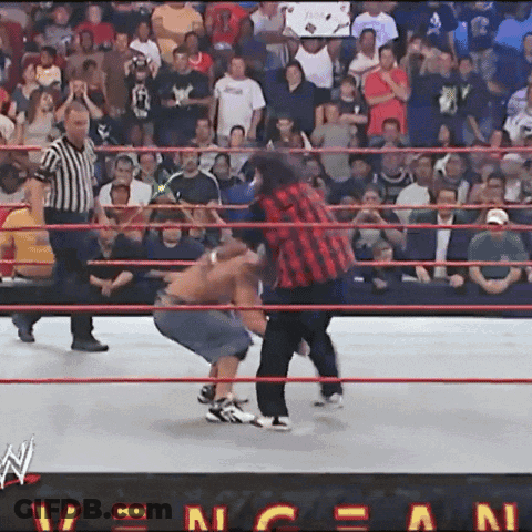 Wrestlers In Front Of RAW Sign GIF