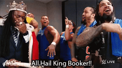 Wrestlers In Locker Room One Wearing Crown And Tie GIF