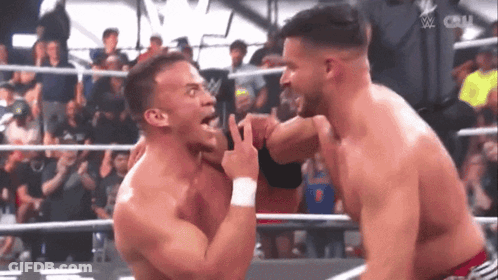 Wrestlers In Ring Thumbs Up GIF
