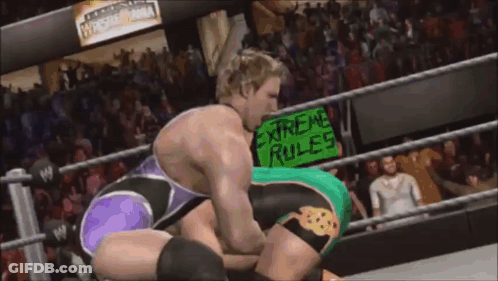 Wrestlers In Ring With Extreme Rules Sign GIF