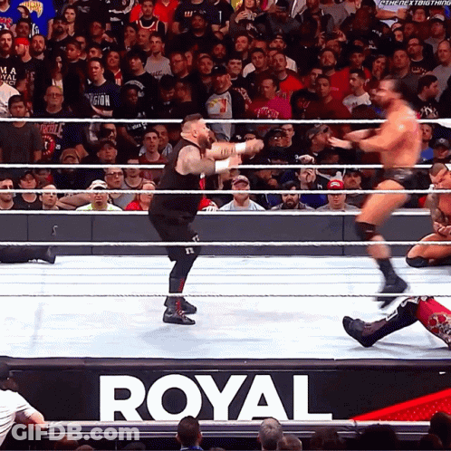 Wrestlers In Ring With Royal Sign GIF