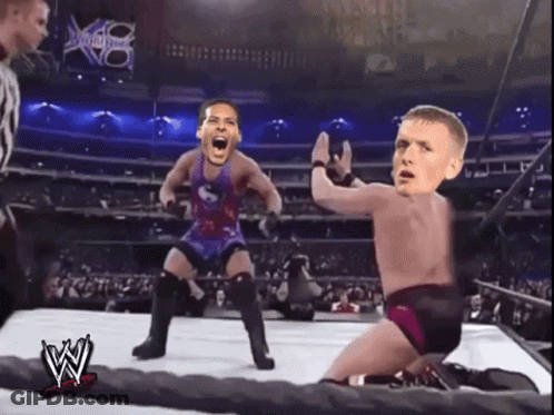 Wrestlers In Wrestling Ring With W Logo GIF