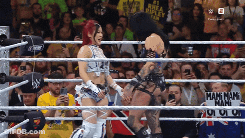 Wrestlers Including One Wearing Babe Shirt GIF