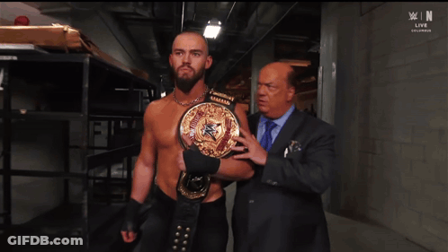 Wrestlers Including One Wearing Babe Shirt GIF