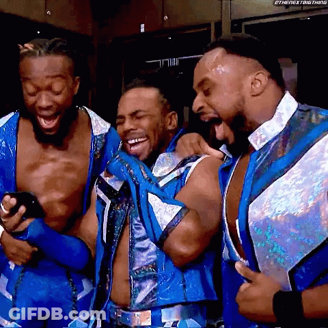 Wrestlers Laughing At Cell Phone GIF