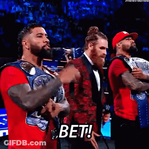 Wrestlers One In Red Shirt And Jacket GIF