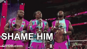 Wrestlers Standing Shame Him GIF