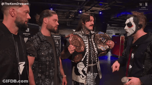 Wrestlers Standing Together GIF