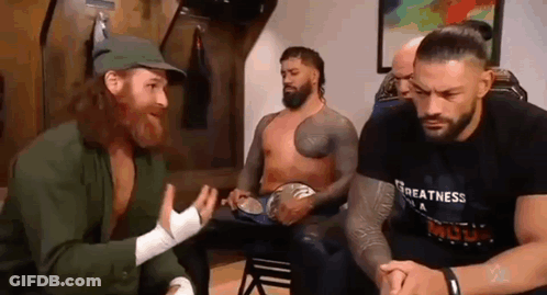 Wrestlers Talking In Locker Room GIF