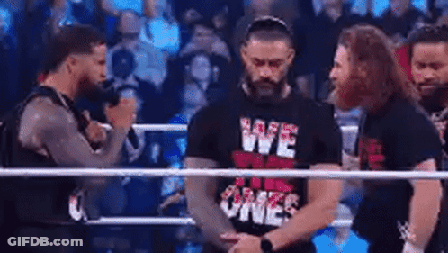 Wrestlers Talking In Wrestling Ring GIF
