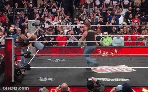 Wrestling Match Crowd Doordash Sign GIF