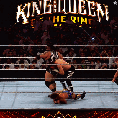 Wrestling Match Under King Queen Sign GIF