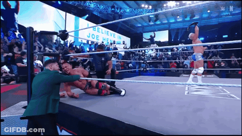 Wrestling Match With I Believe In Joe Henry Sign GIF