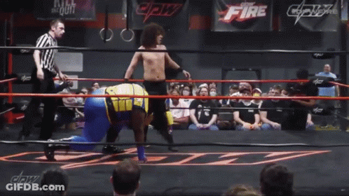 Wrestling Ring With Fire Sign GIF