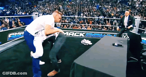 Wrestling Ring With Mackdown On Wall GIF
