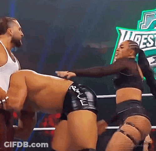 Wrestling Woman Holding Man's Butt GIF
