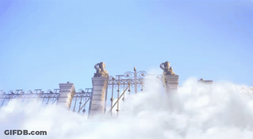 Wrought Iron Gate With Statue GIF