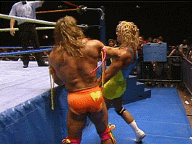 WWE Backhand Pimp Slap GIF