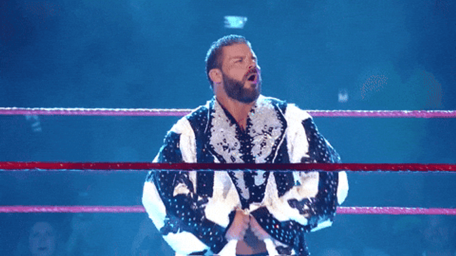 WWE Bobby Roode Revealing His Abs GIF