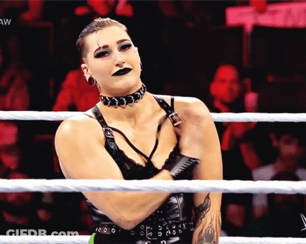 WWE Rhea Ripley Shoulder Brush GIF