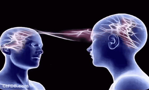 X-Ray Of Two Heads With Glowing Brain Lines GIF