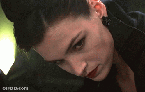 Xenia Onatopp Looking Up GIF