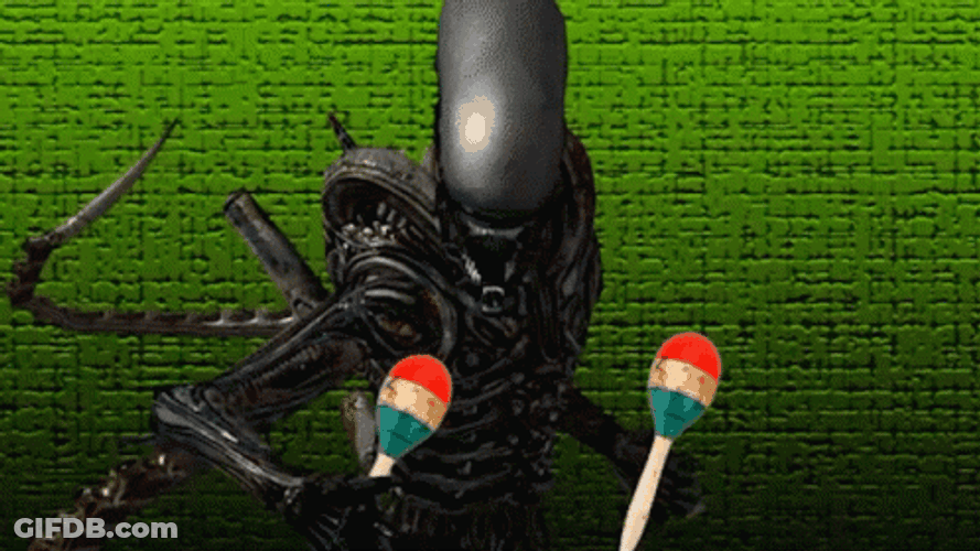Xenomorph Playing Jingle Stick GIF
