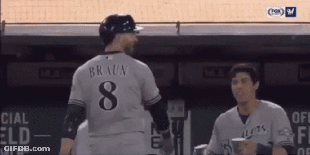 Yelich Receives Glass Of Water From Teammate GIF