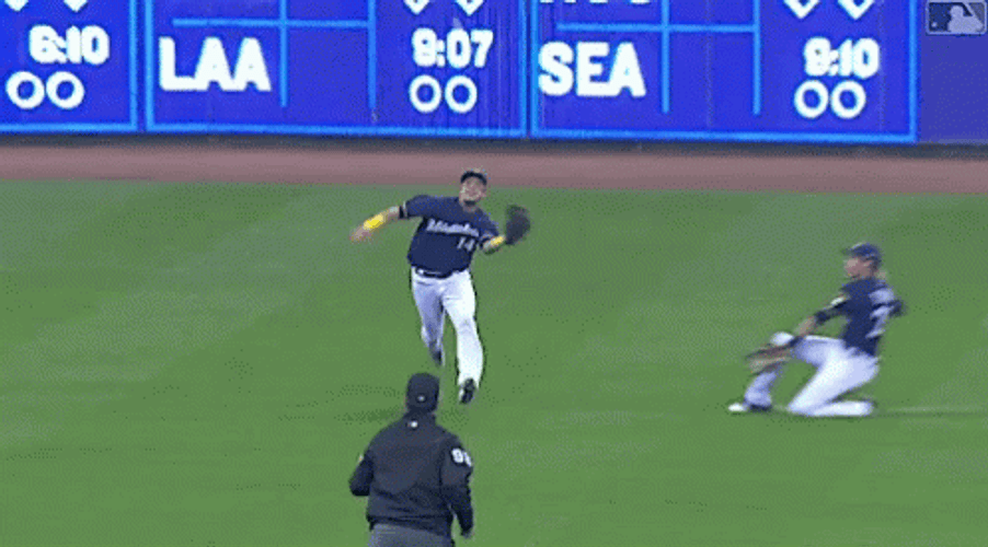 Yelich Slides And Catches Ball GIF