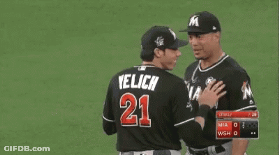 Yelich Victory Laugh With Teammate GIF