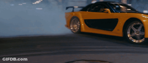 Yellow And Black Sports Car Driving GIF