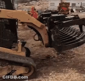 Yellow And Black Tractor With Large Scoop GIF