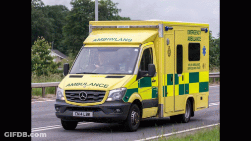 Yellow And Green Ambulance Saying Emergency GIF