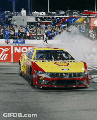 Yellow And Red Race Car Number 22 GIF