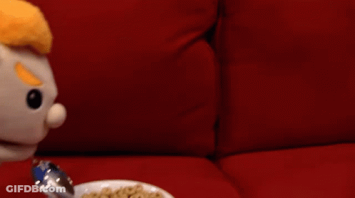 Yellow And White Egg With Cross On Chest GIF